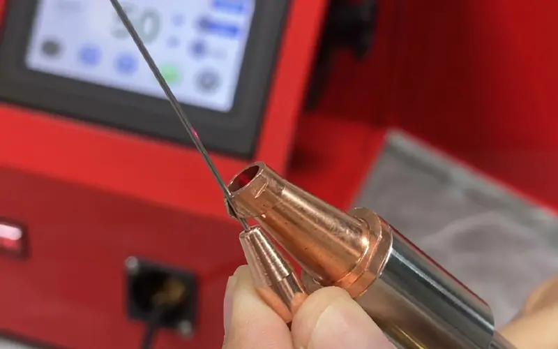 automatic wire feeder bridging 2mm gap on stainless steel joint during handheld laser welding
